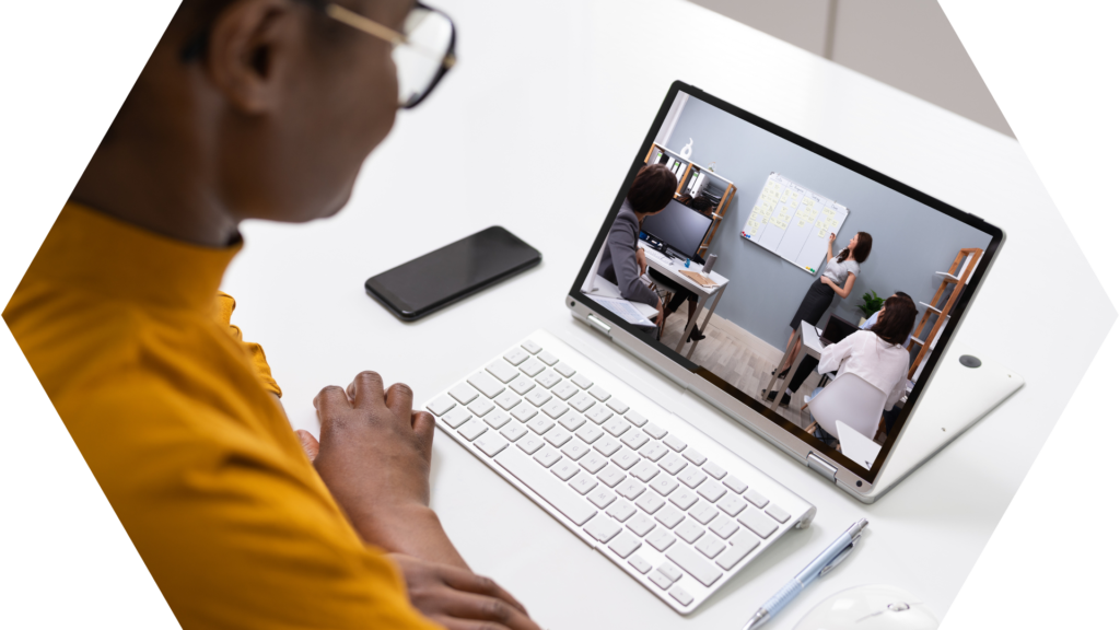 Hybrid meeting user viewing meeting room on laptop